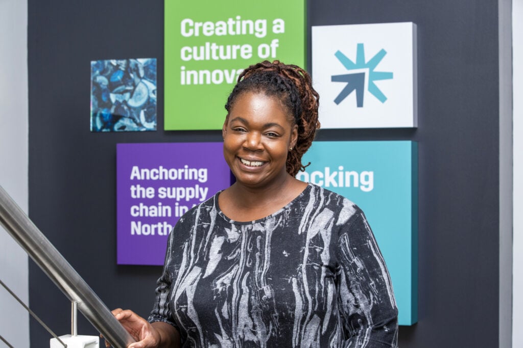 Photo of Net Zero Technology Centre CEO Myrtle Dawes standing and smiling to camera